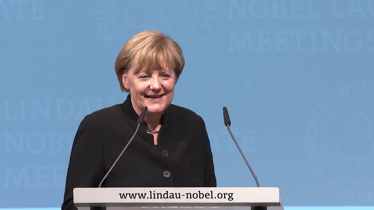 KEYNOTE ADDRESS OF ANGELA MERKEL (GERMAN)  (2014) - Chancellor Angela Merkel delivering her address at the 5th Lindau Nobel Laureate Meeting on Economic Sciences.