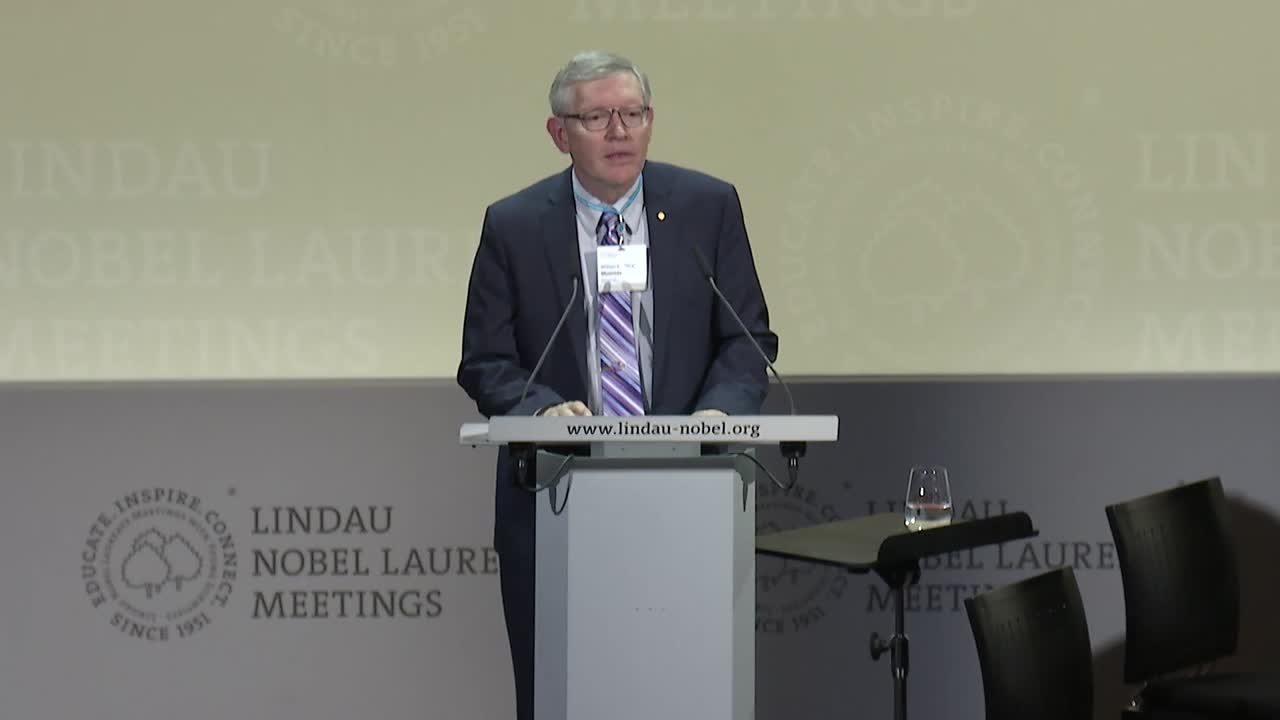 William Moerner on Climate Change (2017) - William Moerner holding Steven Chu's Keynote address on climate change