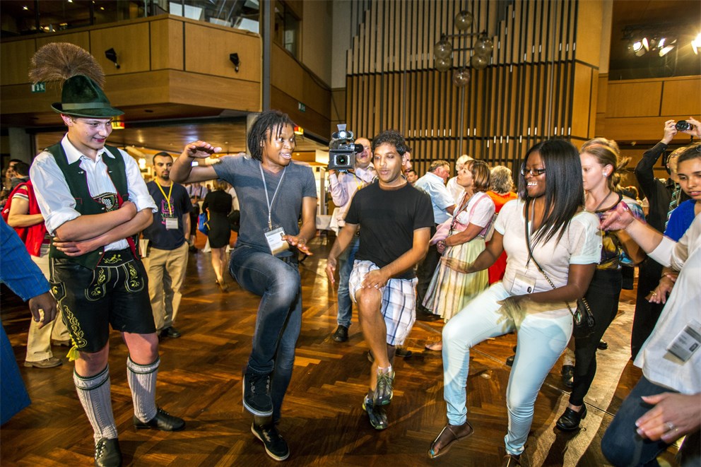 Young researchers dancing during the Bavarian Evening. 