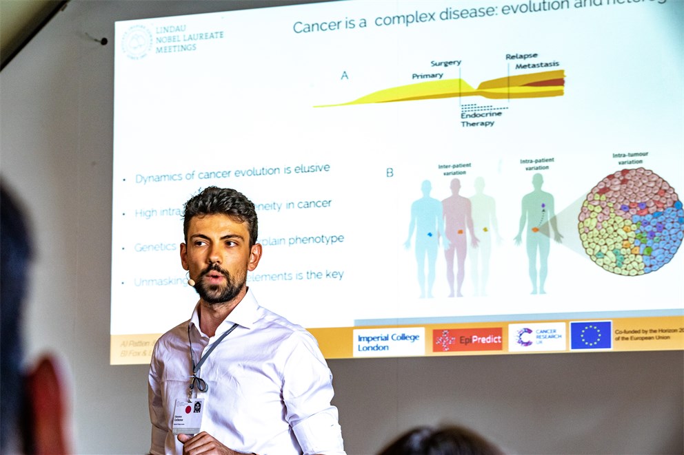 Young scientist presenting his research during a Master Class at the 68th Lindau Nobel Laureate Meeting