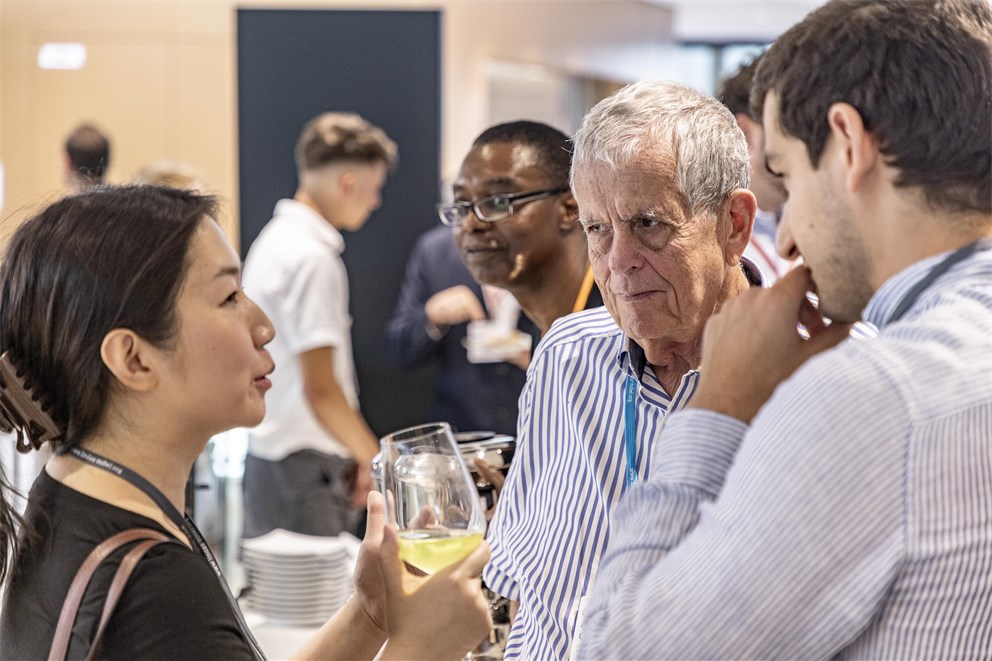 Aaron Ciechanover conversing with Young Scientists