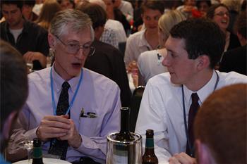 John Mather - Laureate John Mather (Physics 2006) with young researcher during the Singaporean evening
